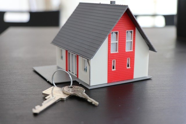 a red and grey house figurine