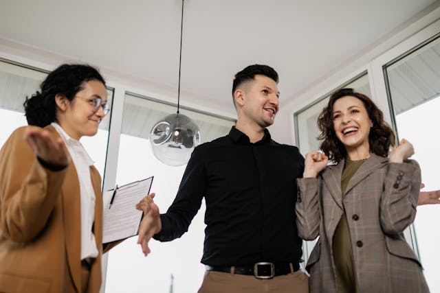 a property managers show two people a home